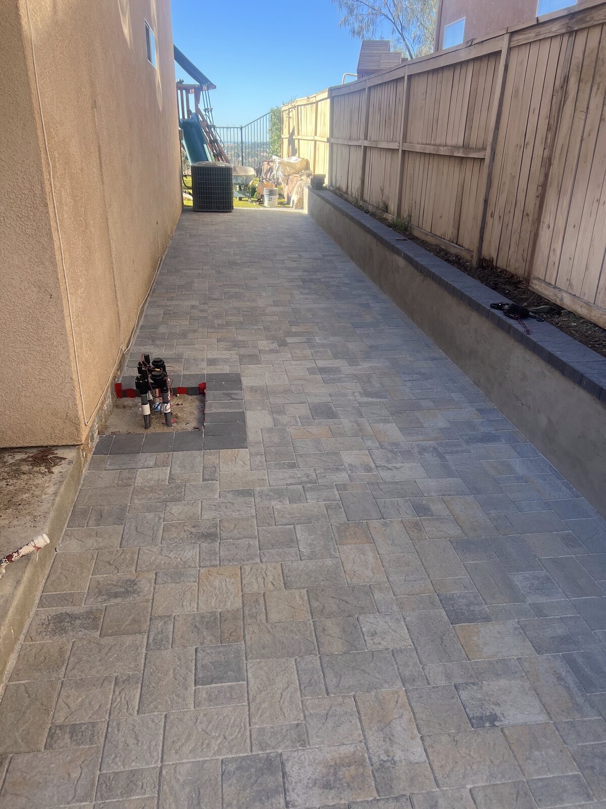 Paver installation begins